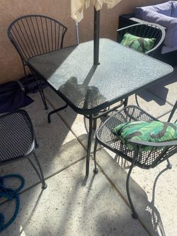Metal Framed Patio Dining Table With Glass Tabletop