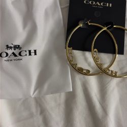 Gold coach earrings 