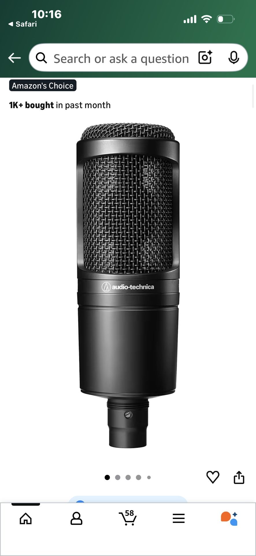 A Pair Of Audio Technica Microphones With Stands