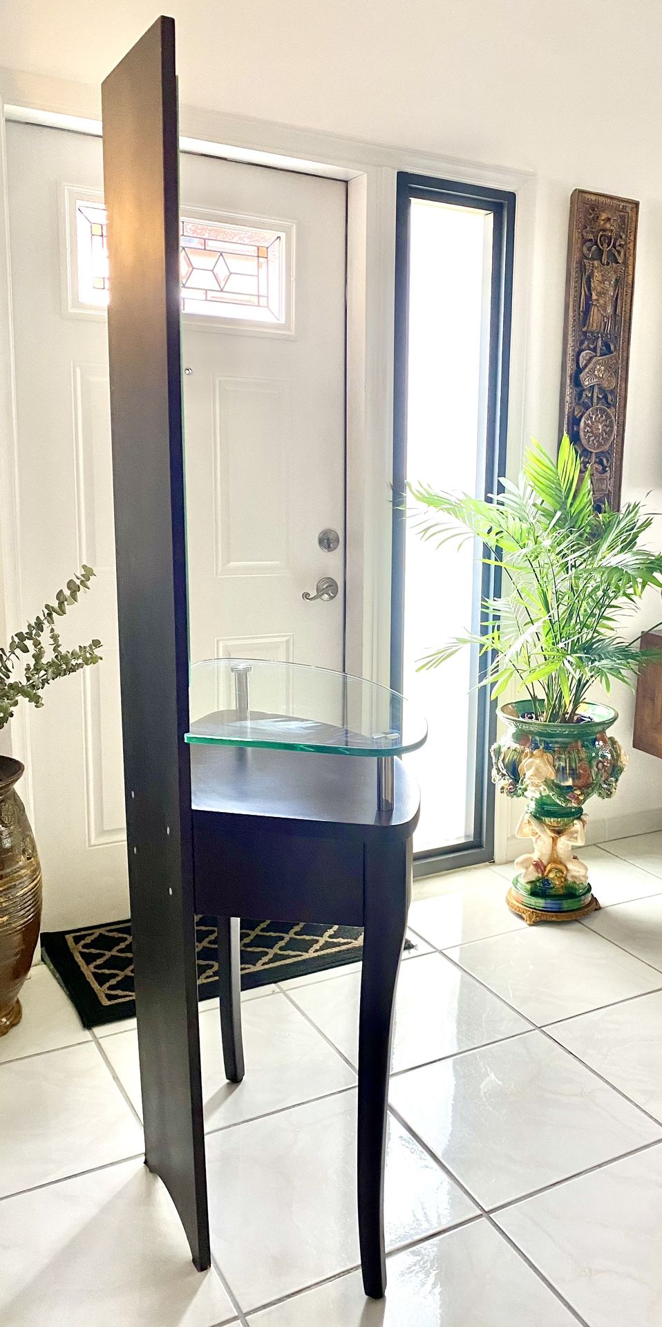 modern console table with a built in mirror and glass shelf