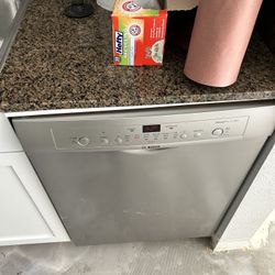 Stainless Steel Appliances Frigidaire Fridge, Samsung Stove And Microwave Bosch Dishwasher Sam