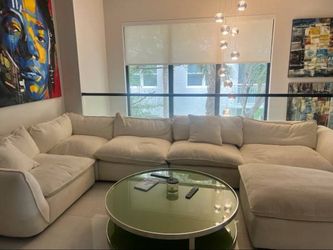 Moving sale expensive couch and coffee table plus wall pictures must go