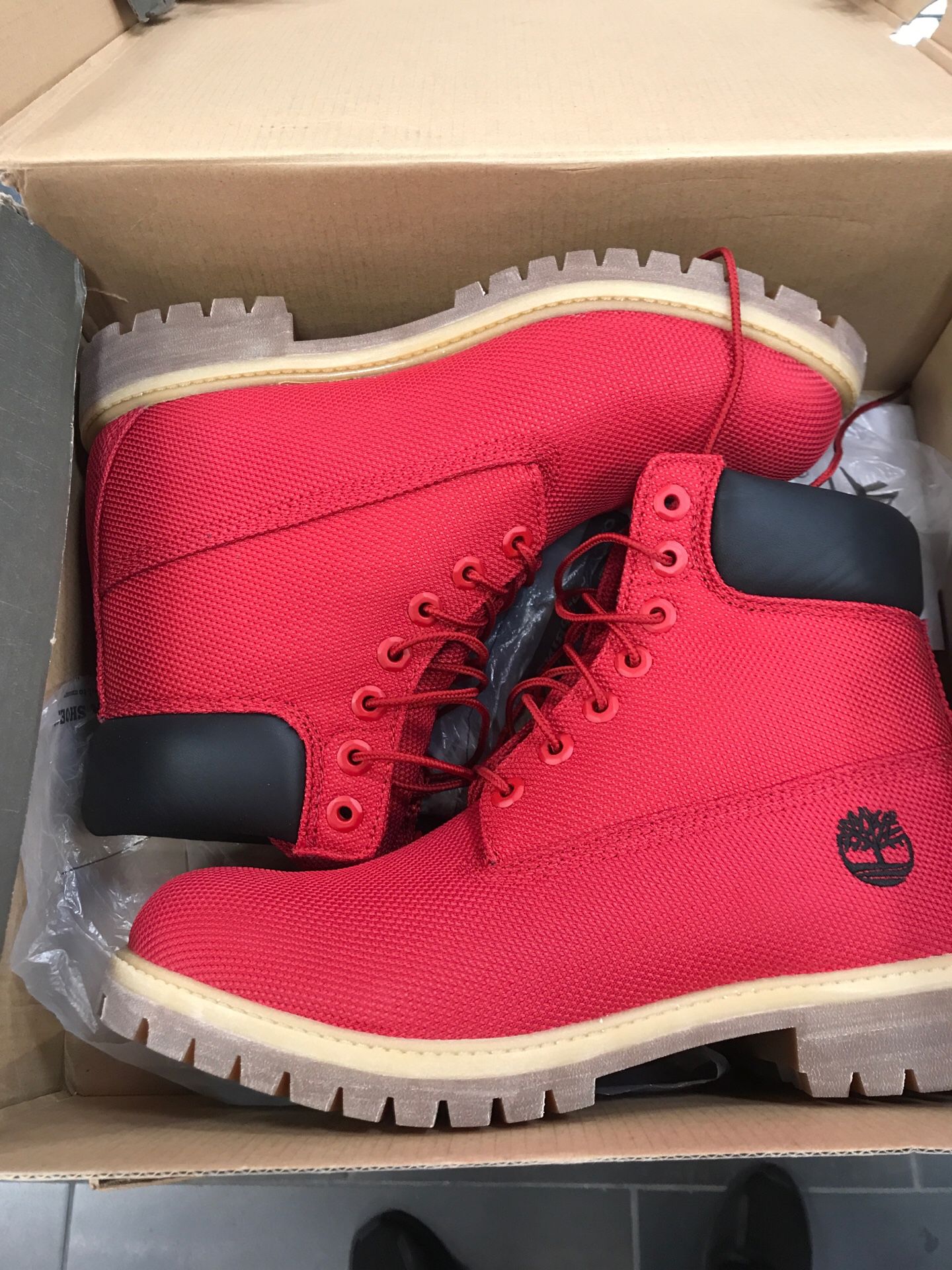 Red Timberland size 9