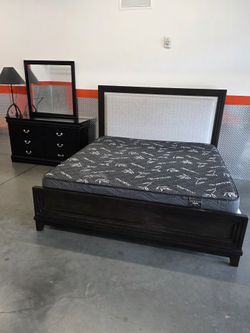 King size bed with mattress and dresser