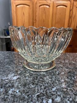 Vintage Beautiful Crystal Bowl on a pedestal.  Pretty cut design.  Size 8 1/2 inches wide and 5 1/2 inches tall.  Has been on display in a curio cabin