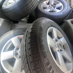 265/70/18 tires. Nissan titan/armada wheels tires