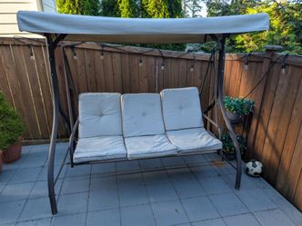 Outdoor swing with canopy