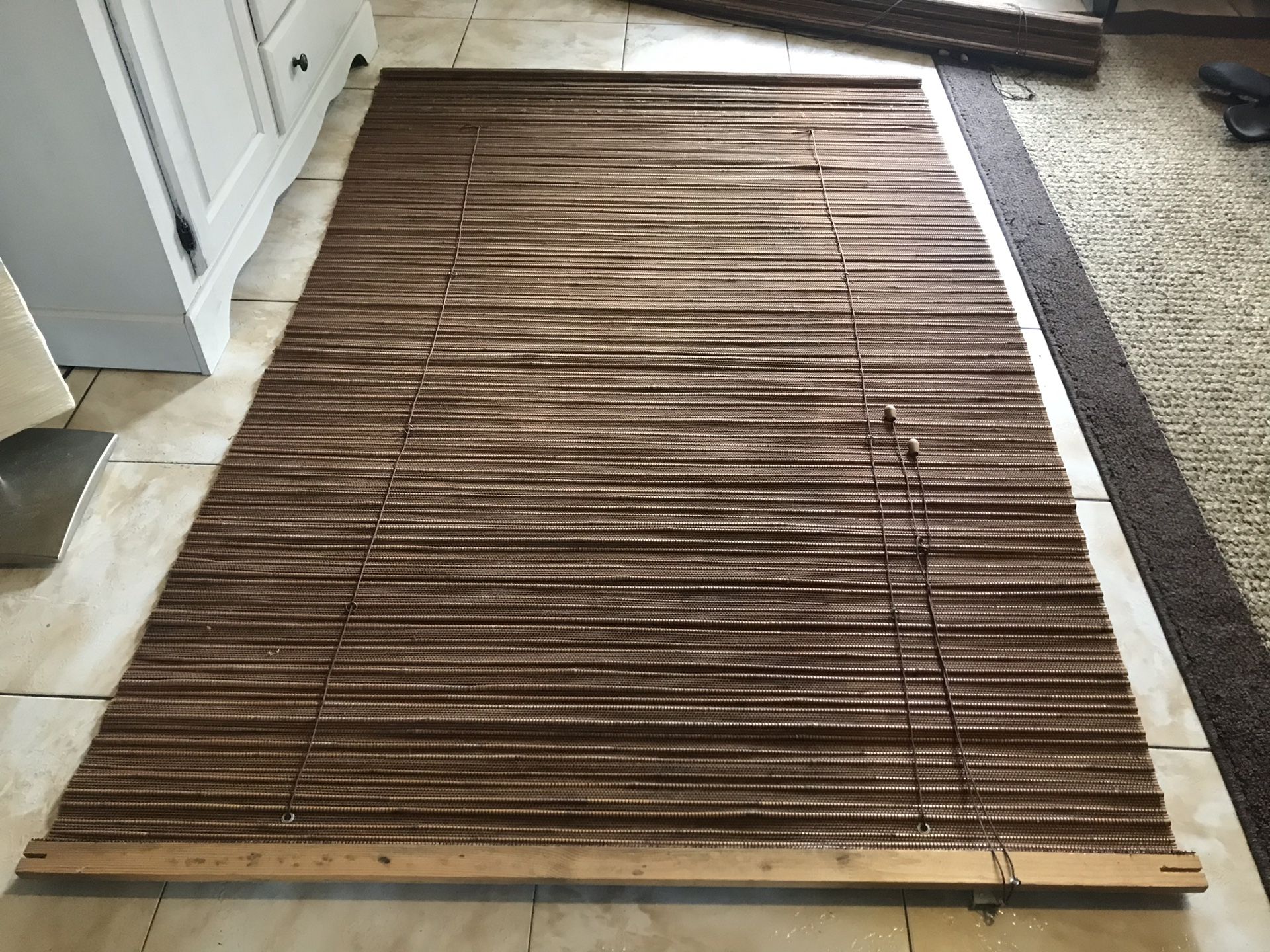 2 brown roll up bamboo blinds 78” long x 50 3/4”wide