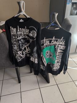 Two Raiders Sweaters Front And Back Showing On Picture Take Both