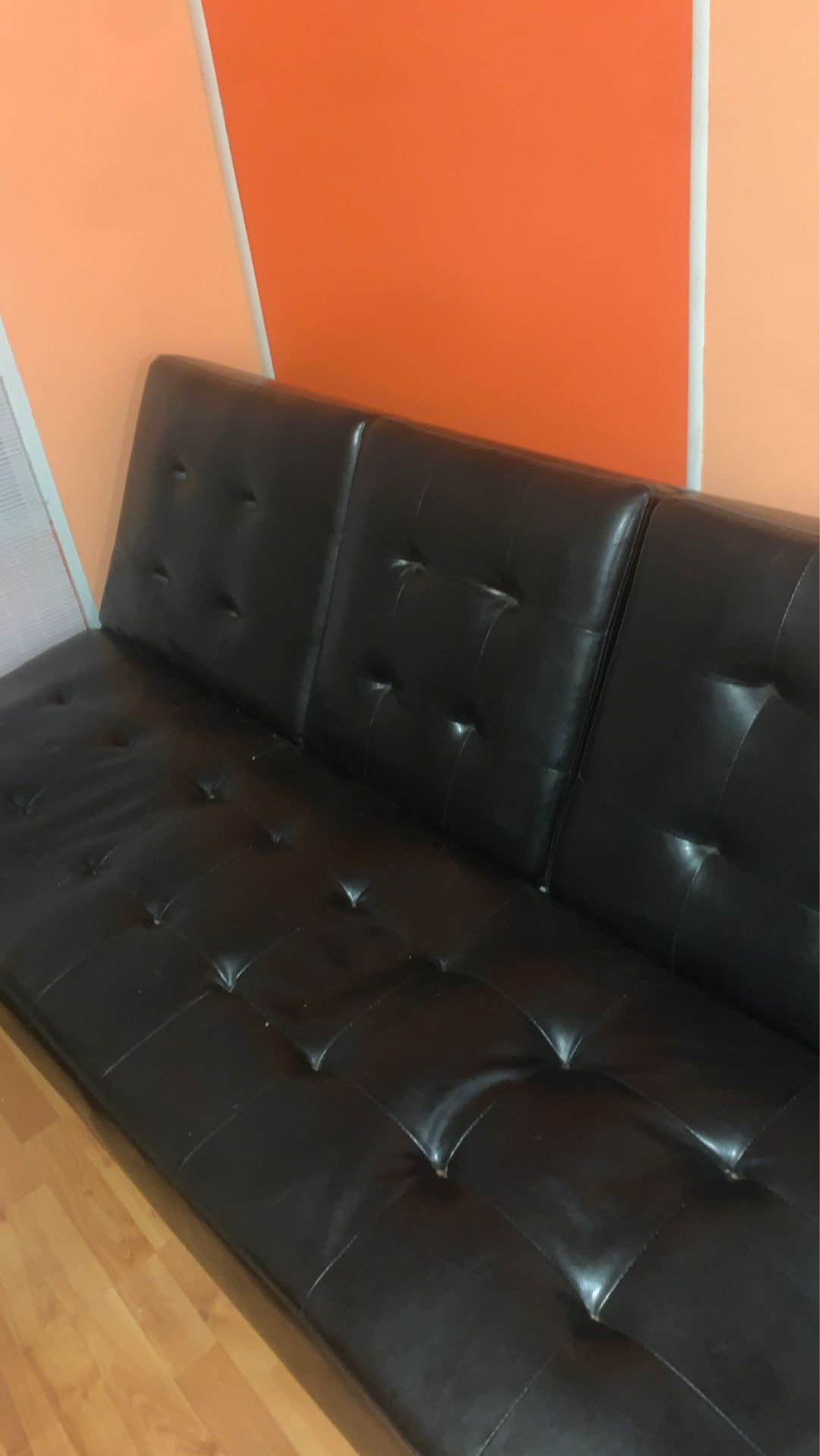 Reclining leather futon