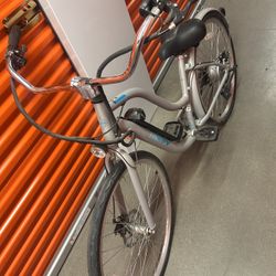 Huffy Electric Assist cruiser bike with a 36V battery system.