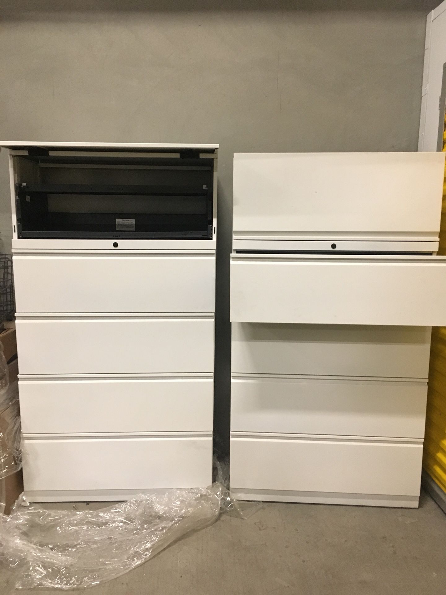 Two new white File cabinets no lock key.
