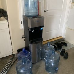 Dipenser And Water Bottles All For $55
