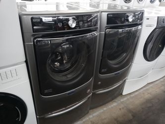 Maytag gray front load washer and gas dryer set on pedestals - Free delivery