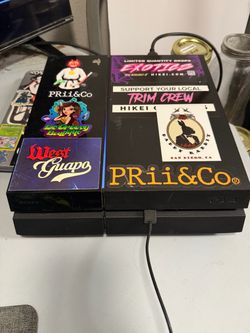 PS4 with 2 Controllers & 3 Games