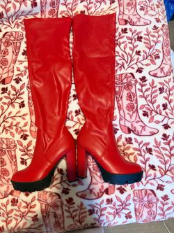 Red high knee boots size 6.5