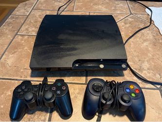 PlayStation 3 with 2 controllers