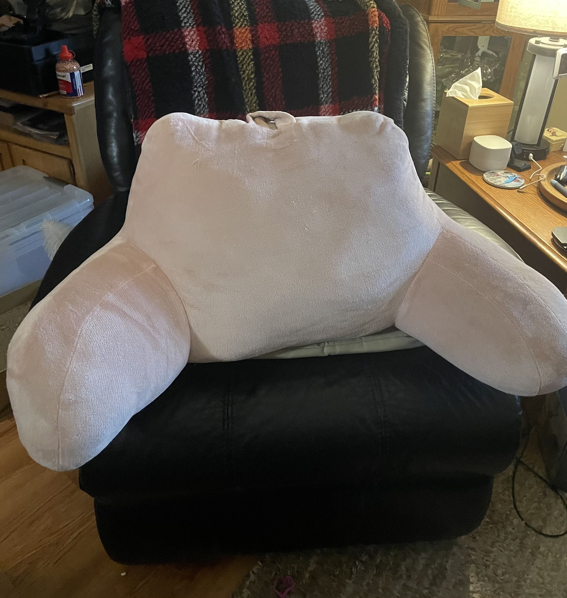 Bed, couch or floor pink pillow