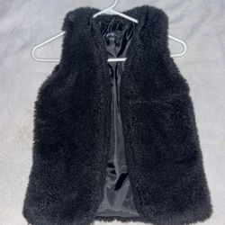 Furry Black Vest, for Girls. Size 10/12.