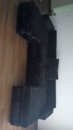 Plush black courdoroy couch