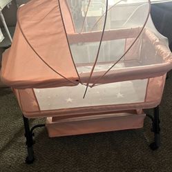 Pink Bedside bassinet