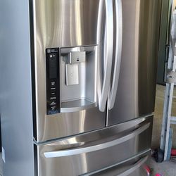 LG 4 DOOR STAINLESS STEEL REFRIGERATOR 