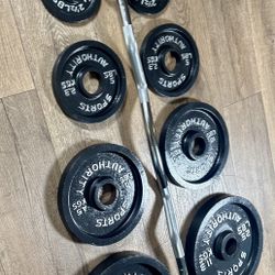 Beautiful  Equipment: Curl Bar W/Cooper Bearings & Pair of Weight Plates 25s, 10s, 5s And 2.5 Pounds. (Total: 105 lbs)  