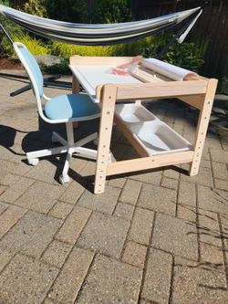 Ikea adjustable desk with chair, bins and paper
