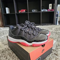 Jordan 11s Varsity Reds