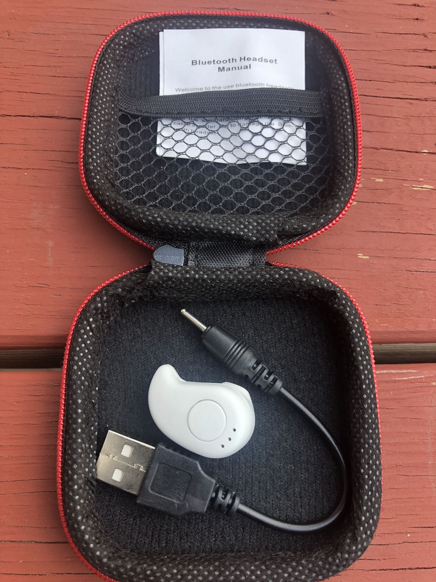 New white Bluetooth earbud with Case