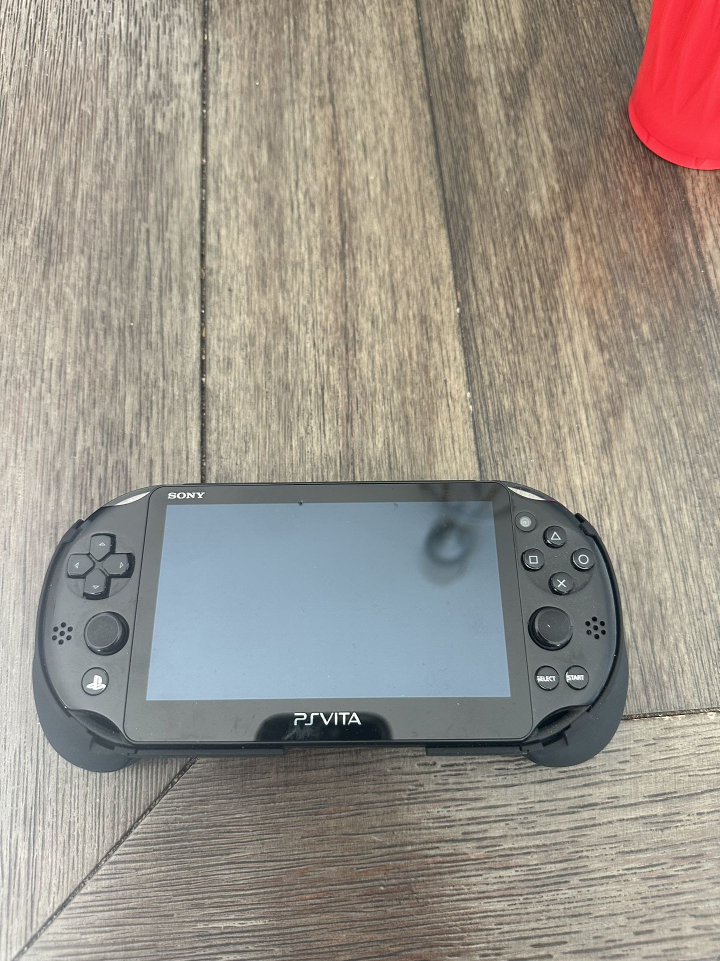 Modded Ps vita With hand Grip, Charger and Storage Case