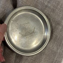 Antique Norwegian pewter dish featuring a Viking ship