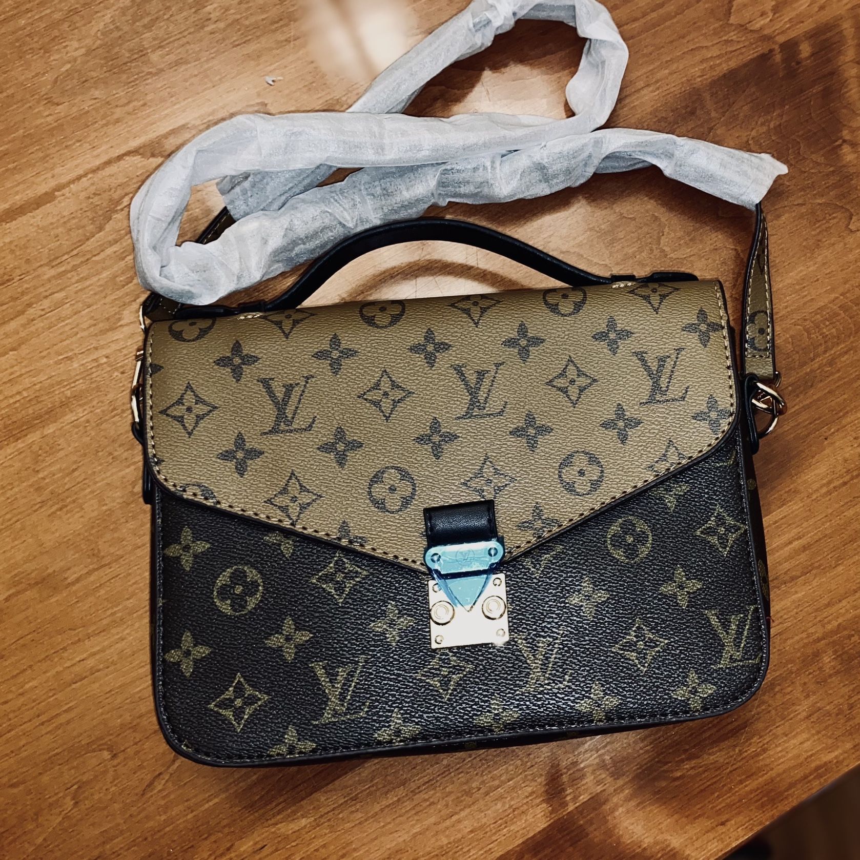 Louis Vuitton Brown Duffle Purse for Sale in Germantown, MD - OfferUp