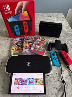 Nintendo Switch OLED with Games and Accessories