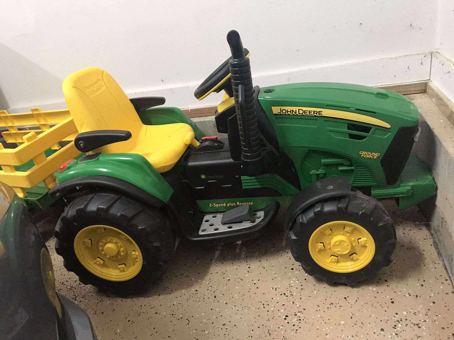 John Deere ride on tractor with pull along trailer