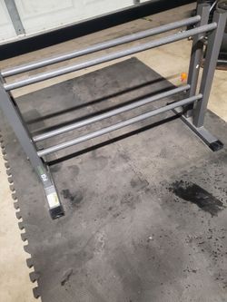Dumbell Rack holds up to 450lbs Base  is 19" Deep x 34.5" Wide. Below Retail Price