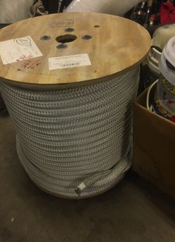 7/8 nyl double beaded role has 600 feet will cut $1.95 ft entire spool $900. Weighs 118 lb