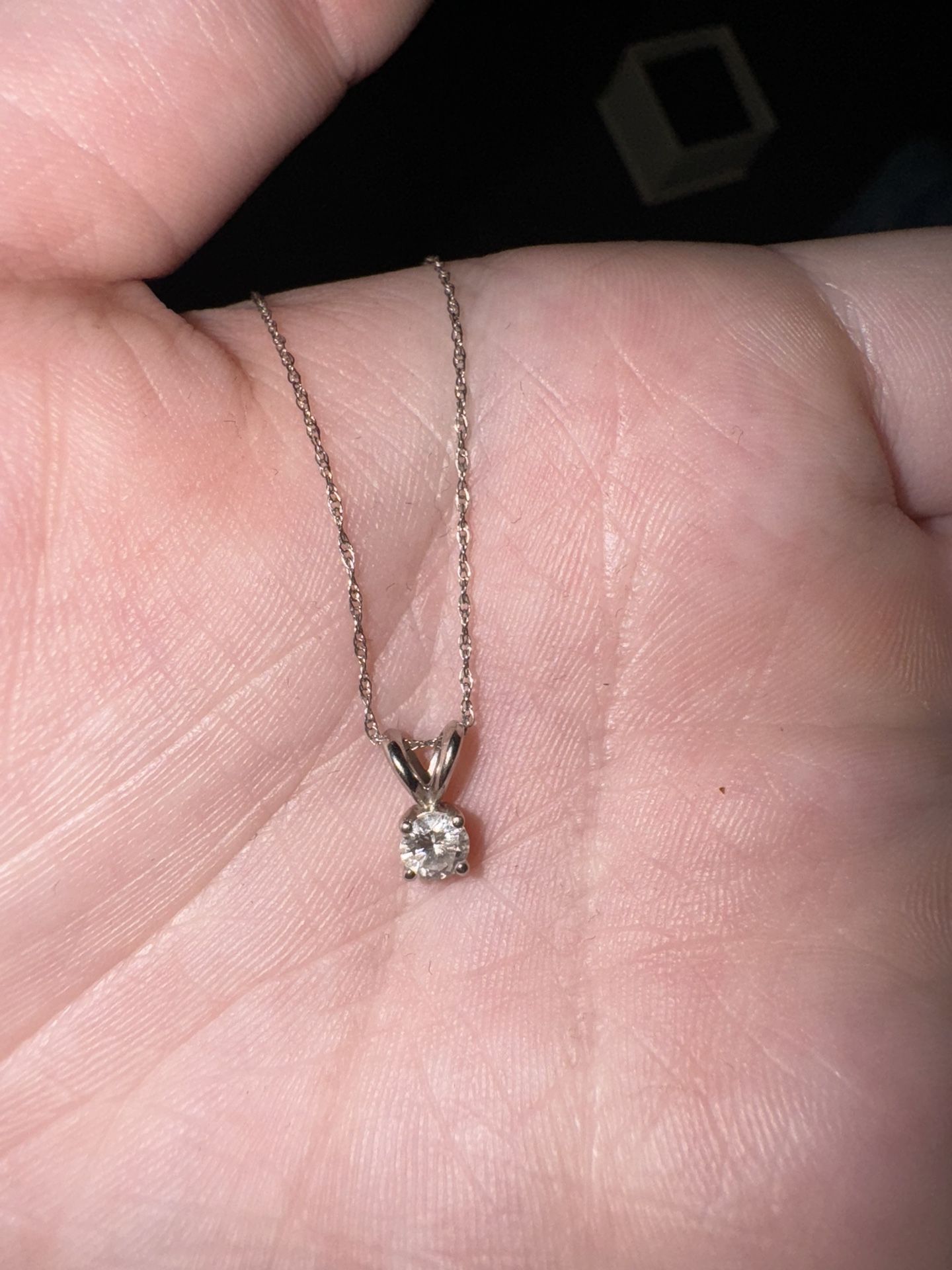 0.20 carat diamond with white gold chain 