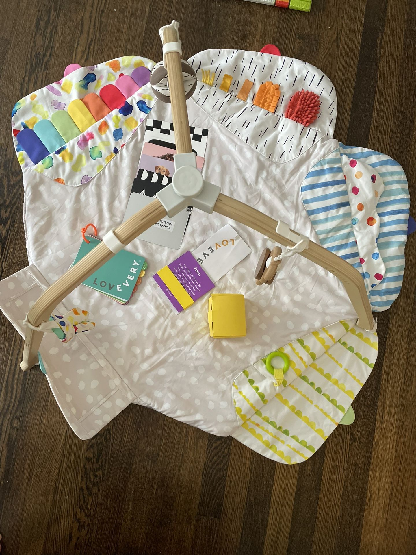 LOVEVERY Play Gym including 3 hanging toys, card inserts, tent cover $90