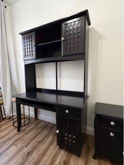 Desk with upper hutch and side cabinet.