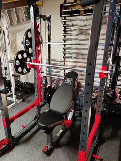 Home gym(smith machine)+ xtra barbell+curl bar+weigth+gym mats