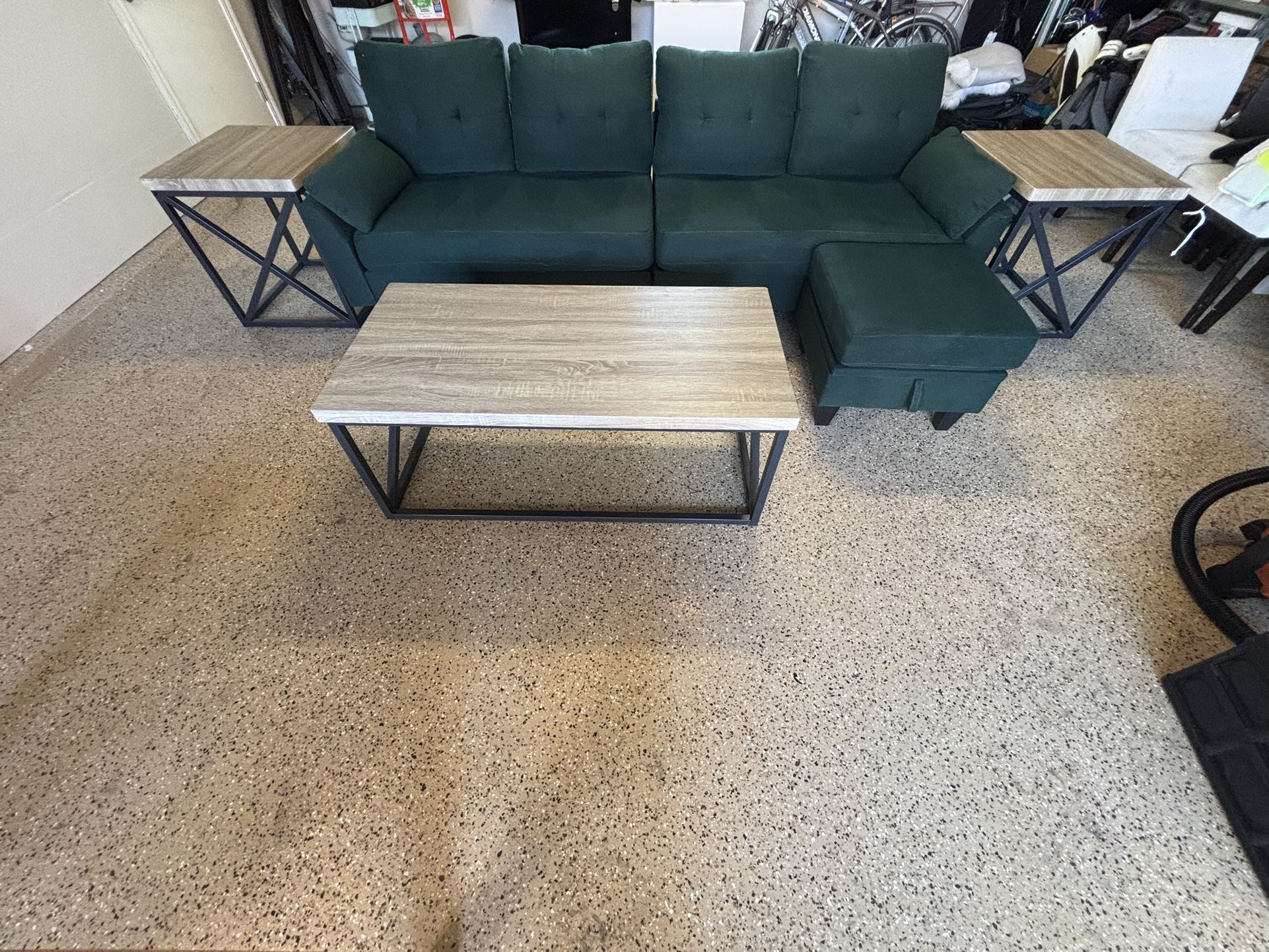 Green Sectional With Ottoman And Two End Tables And Coffee Table