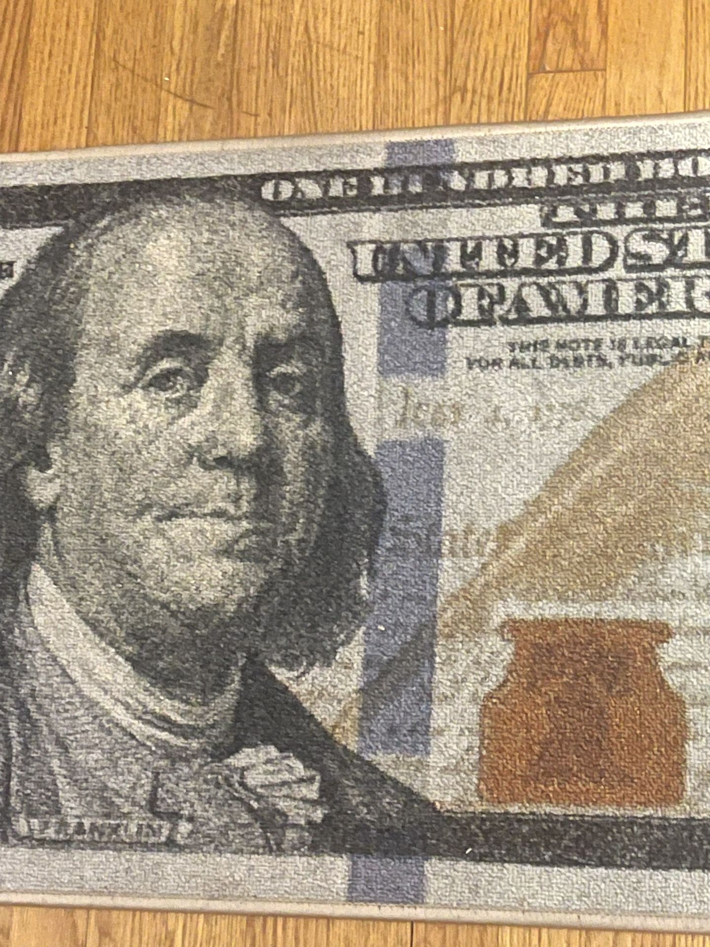 $100 bill rug