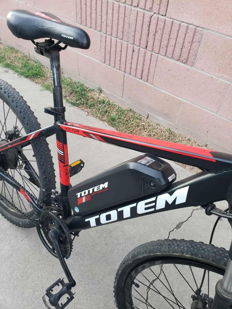 40miles Range. 28mph red & Black. Slow Bikes under 20mph are under $400!. Mile is 28mph all work 100% Electric Bike Ebike E-bike for $500! Or best off