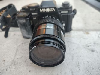 Minolta Maxxum 35mm Film SLR Camera with Lens