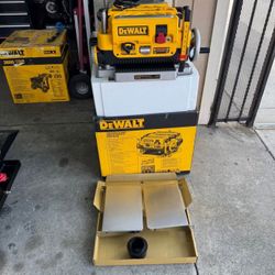 DEWALT 15 Amp Corded 13 in. Heavy-Duty 2-Speed Bench Planer In Feed Table and Out F