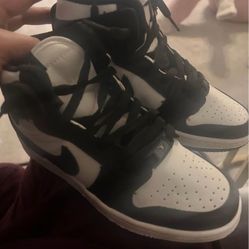 Black and white air Jordan 1 mid top shoes