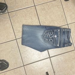 Rock Revival Ripped Jeans