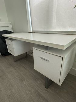 Modern white desk with file cabinet