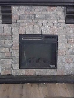 Electric Fireplace with Realistic Stone Mantel (Excellent Condition)